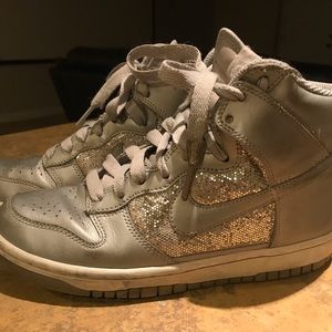 Metallic silver Nike shoes